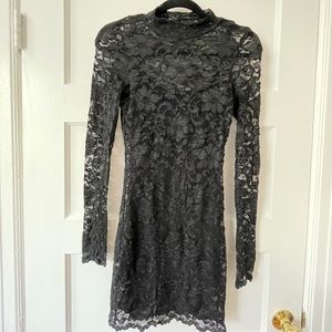 Donna Mizani black lace mini dress